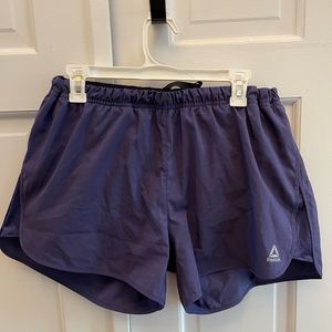 Reebok Purple speedwick active shorts for women size XL